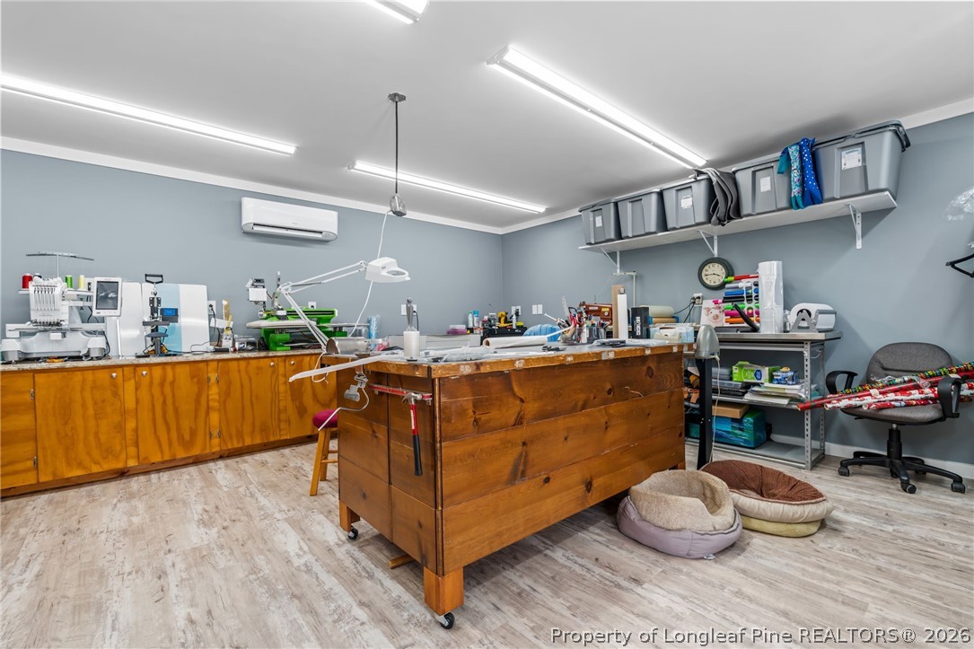 4240 Nicholson Road Cameron, NC 28326 - Photo 34 of 49 a room with wooden cabinets and wooden floor