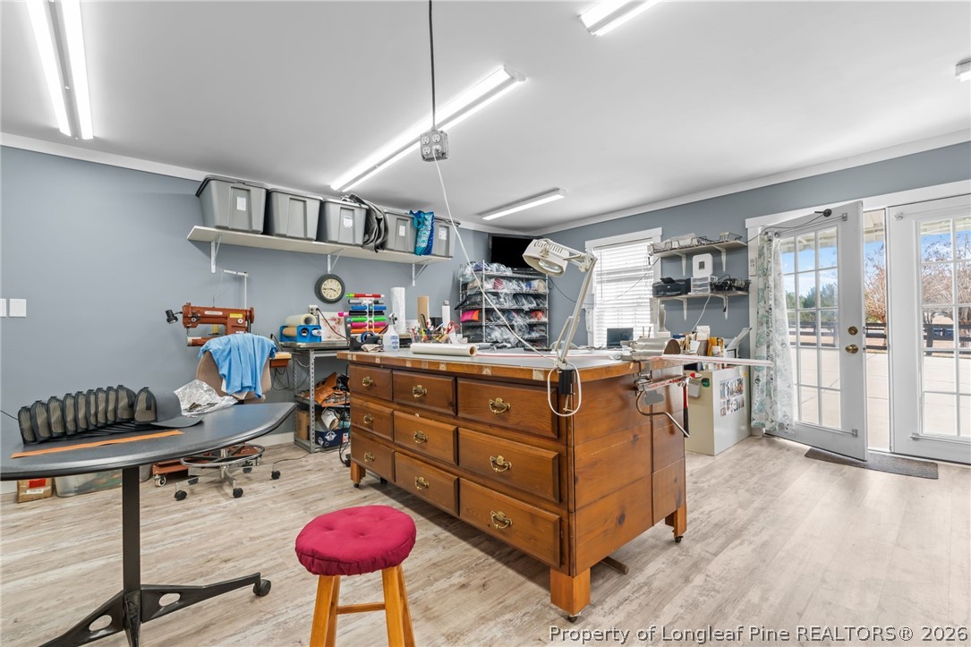 4240 Nicholson Road Cameron, NC 28326 - Photo 35 of 49 a kitchen with stainless steel appliances kitchen island granite countertop a stove refrigerator and cabinets
