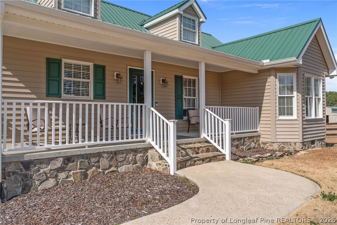 4240 Nicholson Road Cameron, NC 28326 - Photo 36 of 49 front view of a house with a porch