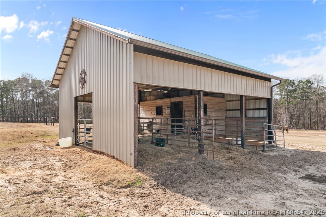 4240 Nicholson Road Cameron, NC 28326 - Photo 47 of 49 a view of a house with a yard