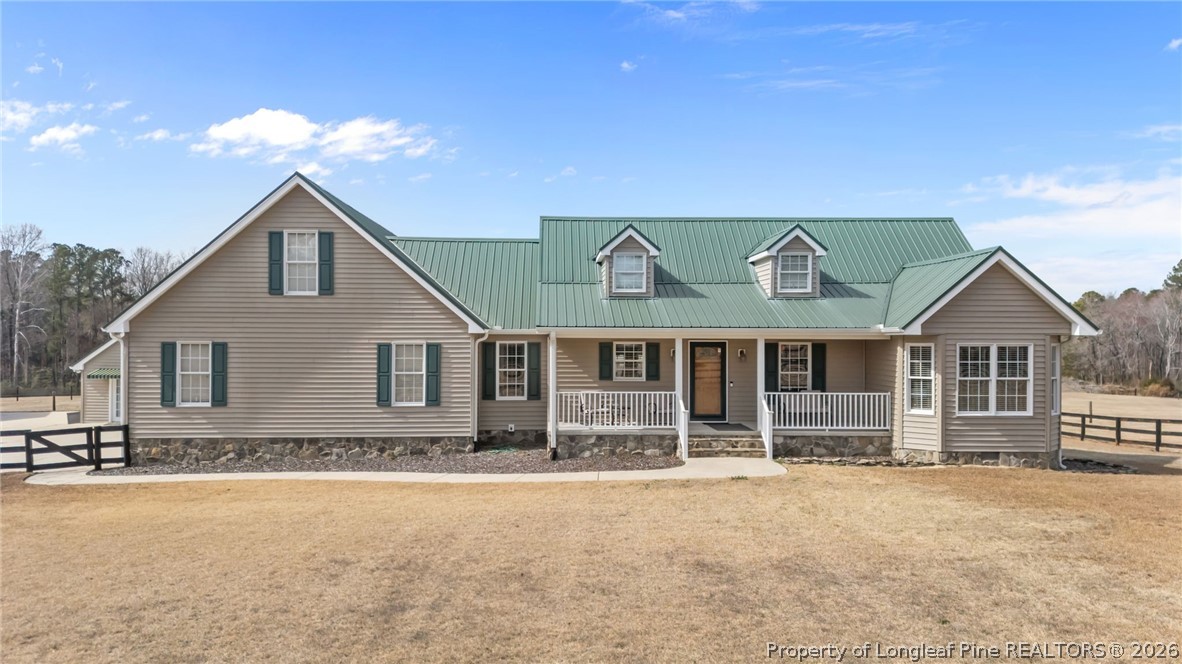 4240 Nicholson Road Cameron, NC 28326 - Photo 5 of 49 a front view of house with yard