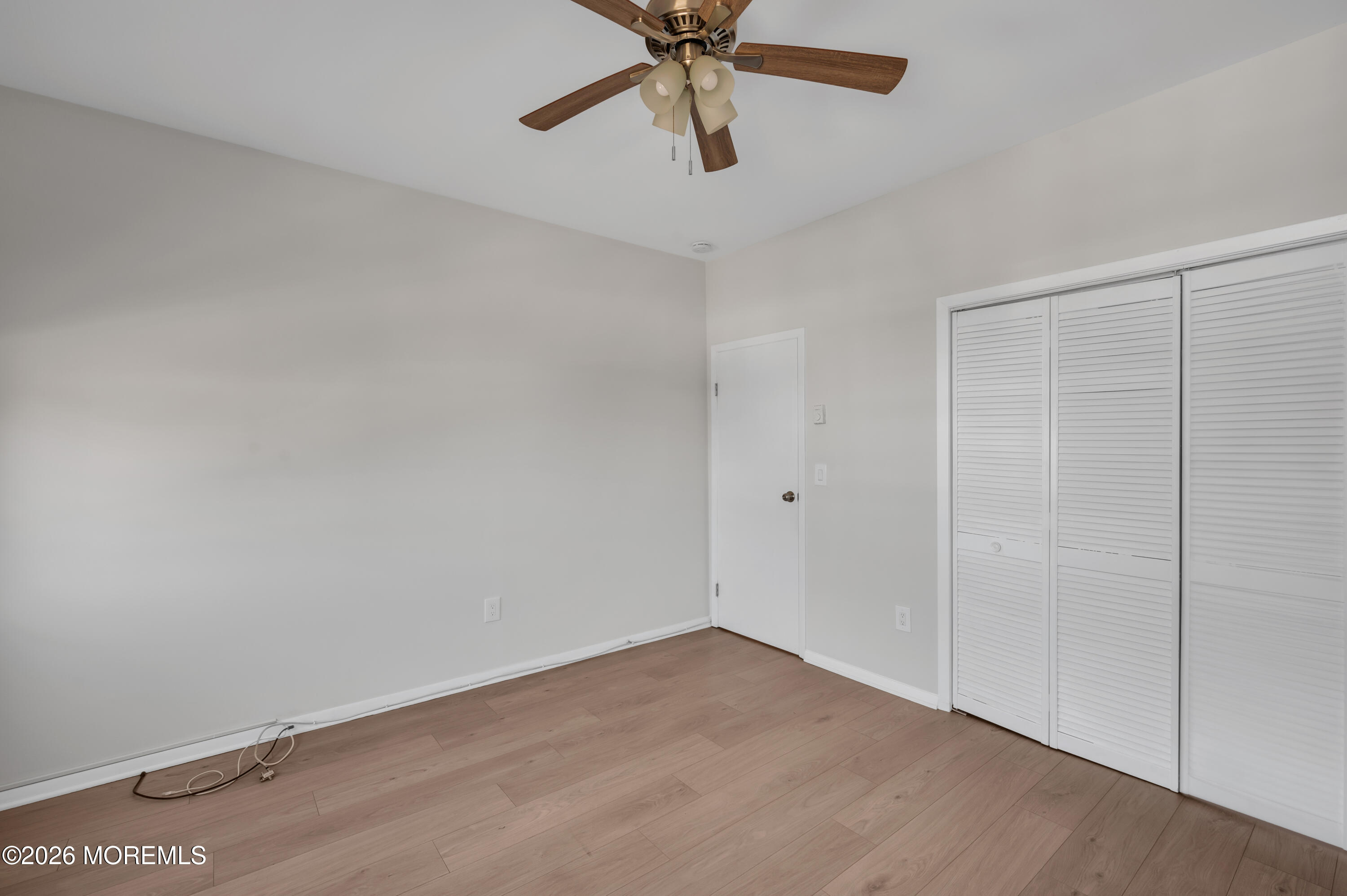 31-33 East Front Street, Unit 2 Red Bank, NJ 07701 - Photo 21 of 21 a view of an empty room with a window