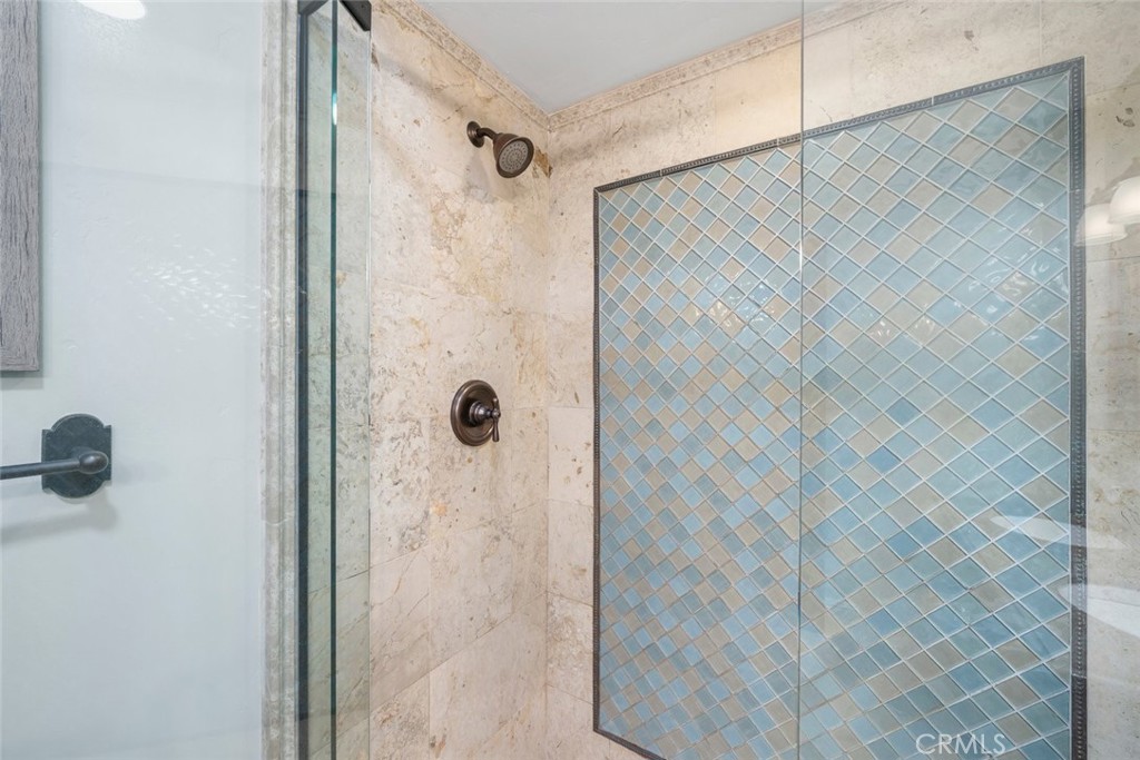 160 Hinds Avenue, Unit 202 Pismo Beach, CA 93449 - Photo 24 of 47 a bathroom with a shower