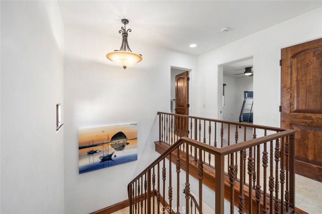 160 Hinds Avenue, Unit 202 Pismo Beach, CA 93449 - Photo 30 of 47 a view of a hallway view with staircase
