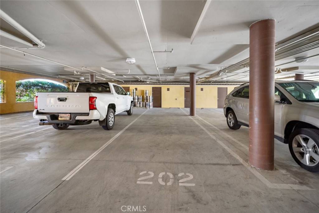 160 Hinds Avenue, Unit 202 Pismo Beach, CA 93449 - Photo 43 of 47 a view of parking garage with cars