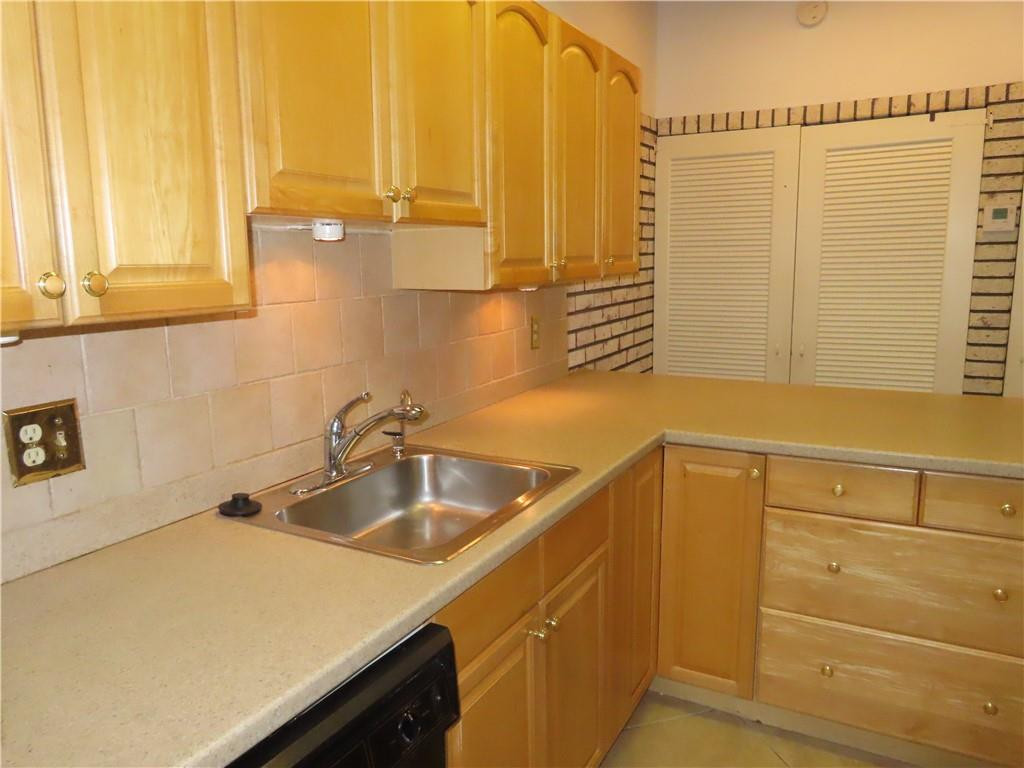 8801 Gatehouse Road, Unit 7 Plantation, FL 33324 - Photo 13 of 29 Another kitchen view