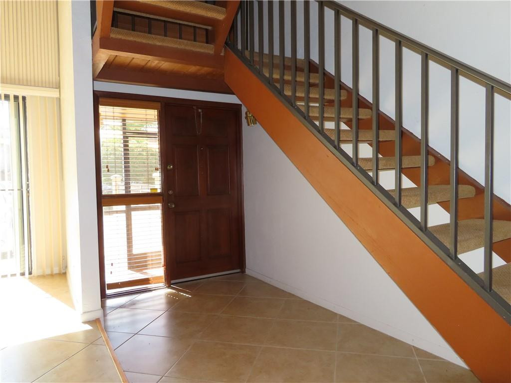 8801 Gatehouse Road, Unit 7 Plantation, FL 33324 - Photo 6 of 29 Foyer and stairs