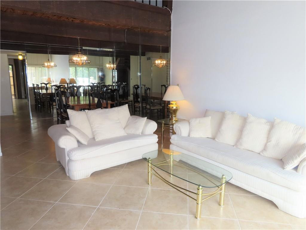 8801 Gatehouse Road, Unit 7 Plantation, FL 33324 - Photo 8 of 29 Living area looking toward dining area