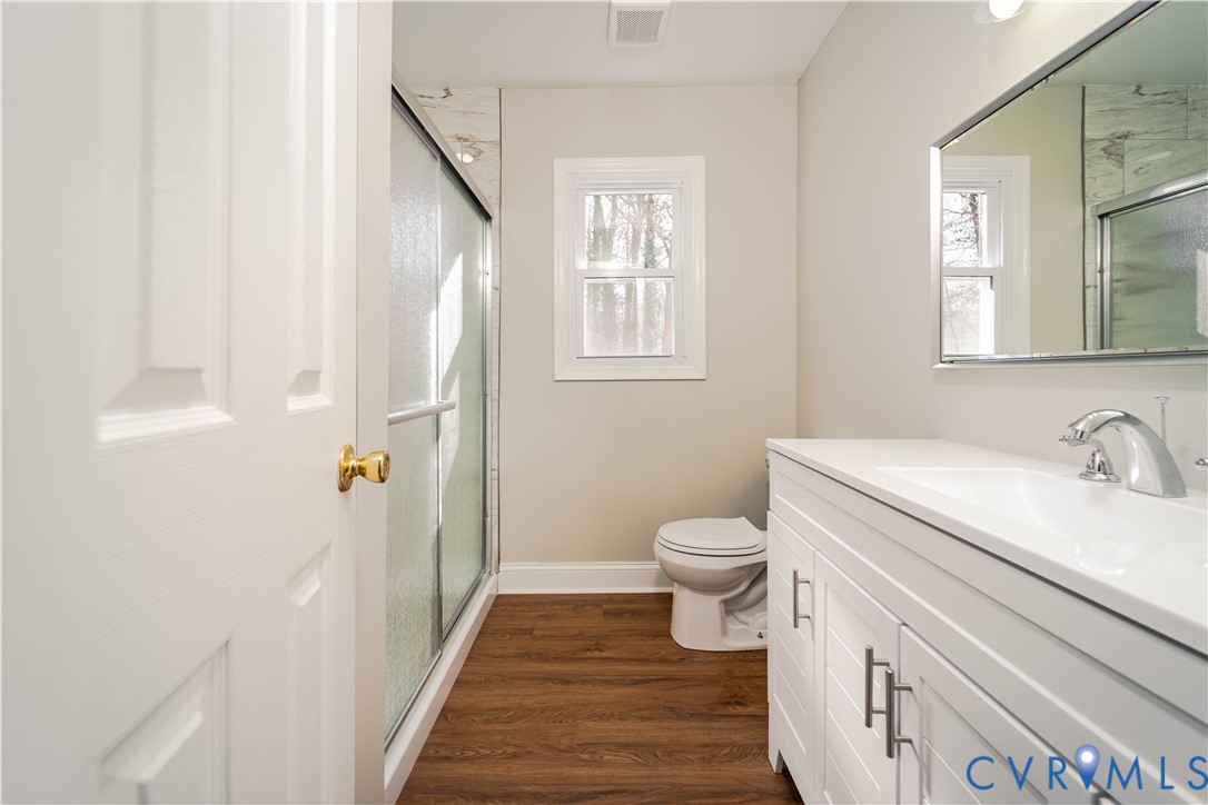3025 Maplevale Road Chester, VA 23831 - Photo 11 of 14 Bathroom featuring a white vanity with integrated
