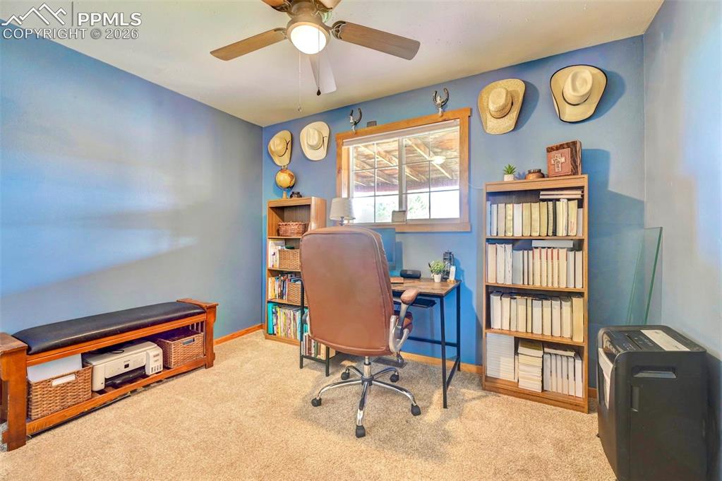 18560 Chelton Road Ramah, CO 80832 - Photo 18 of 34 a view of a livingroom with furniture and a window