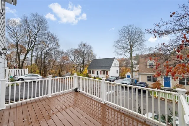 a view of a street with a deck
