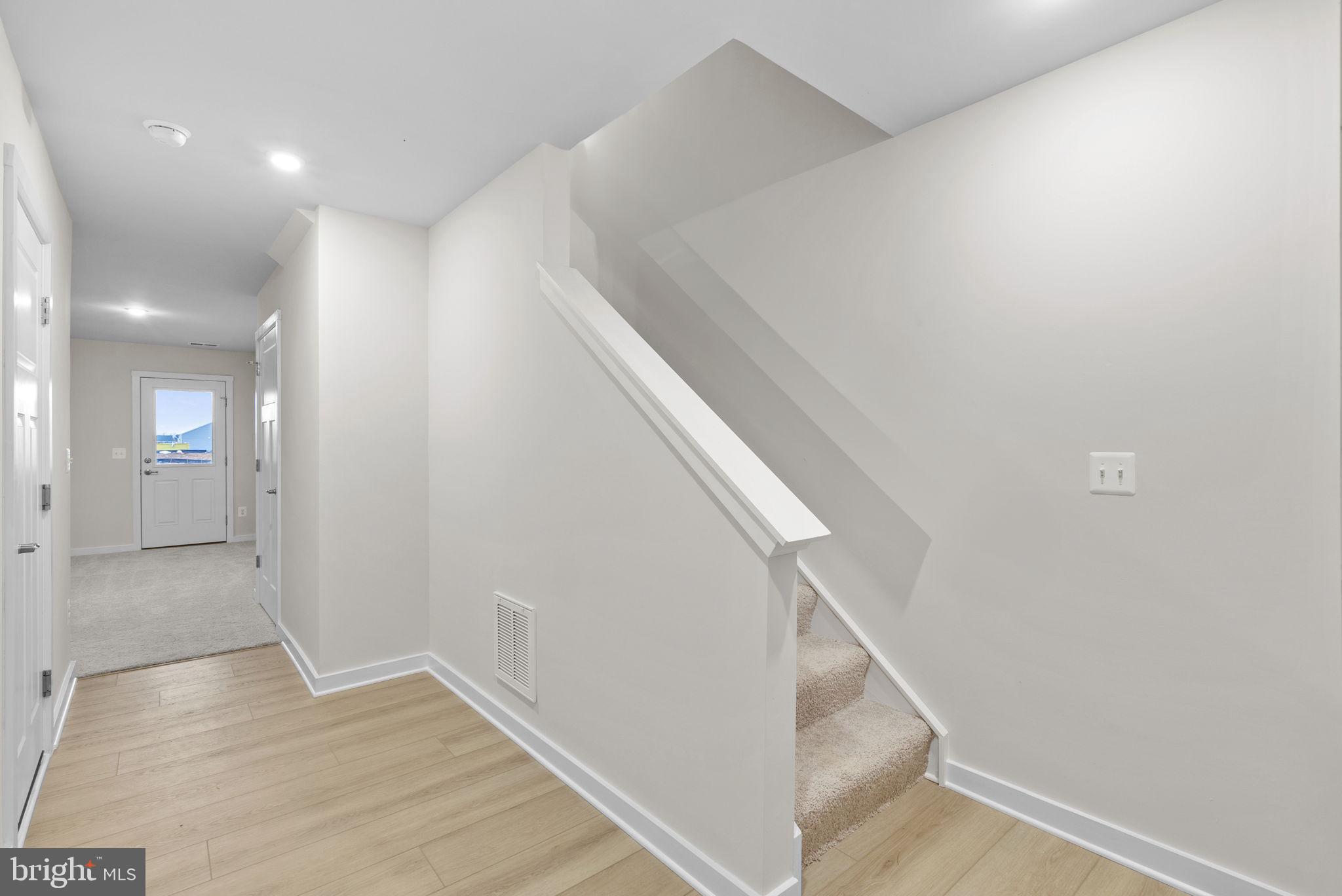 132 Huntwell W Avenue Ranson, WV 25438 - Photo 6 of 48 a view of hallway with stairs