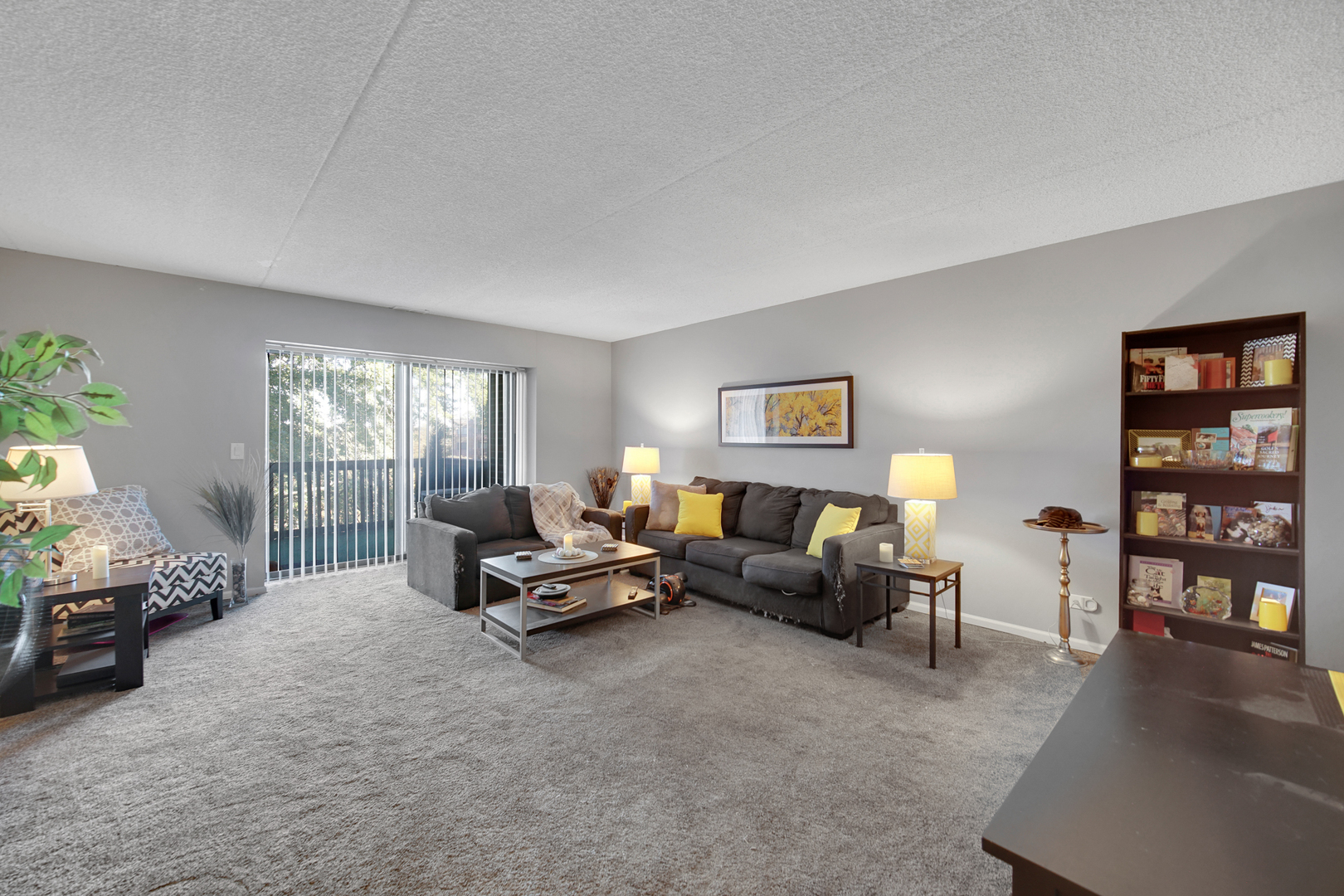 690 Chandler Road, Unit 302 Gurnee, IL 60031 - Photo 11 of 51 a living room with furniture and wooden floor