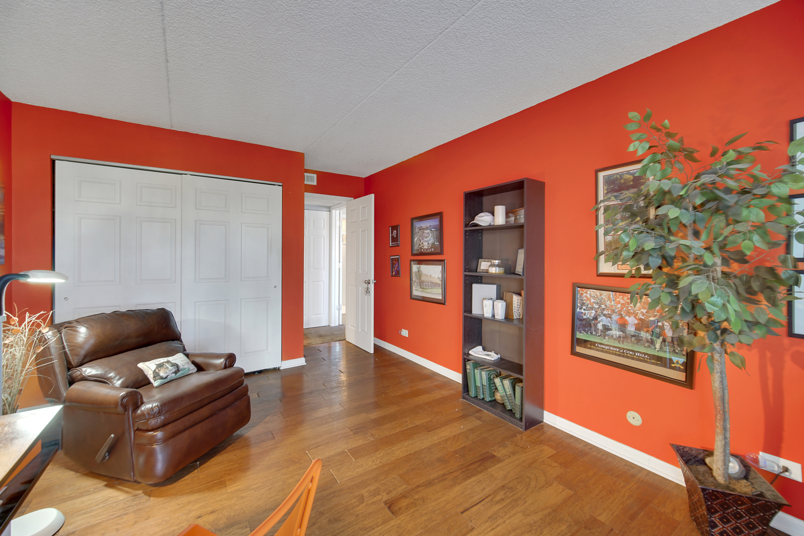 690 Chandler Road, Unit 302 Gurnee, IL 60031 - Photo 21 of 51 a living room with furniture and a flat screen tv