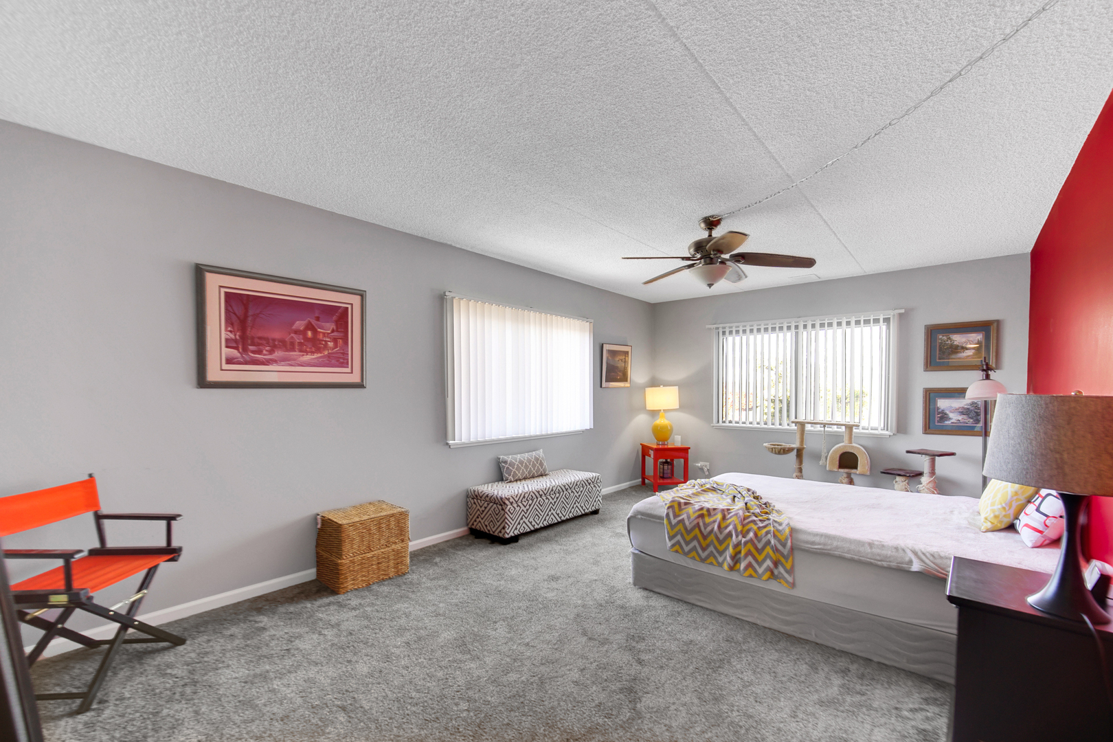 690 Chandler Road, Unit 302 Gurnee, IL 60031 - Photo 22 of 51 a bedroom with furniture a bed and a chandelier