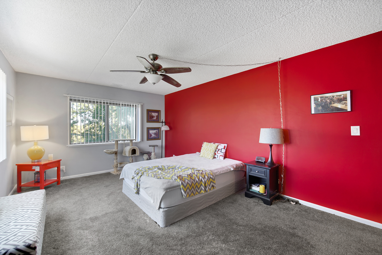 690 Chandler Road, Unit 302 Gurnee, IL 60031 - Photo 23 of 51 a bedroom with a bed and a couch