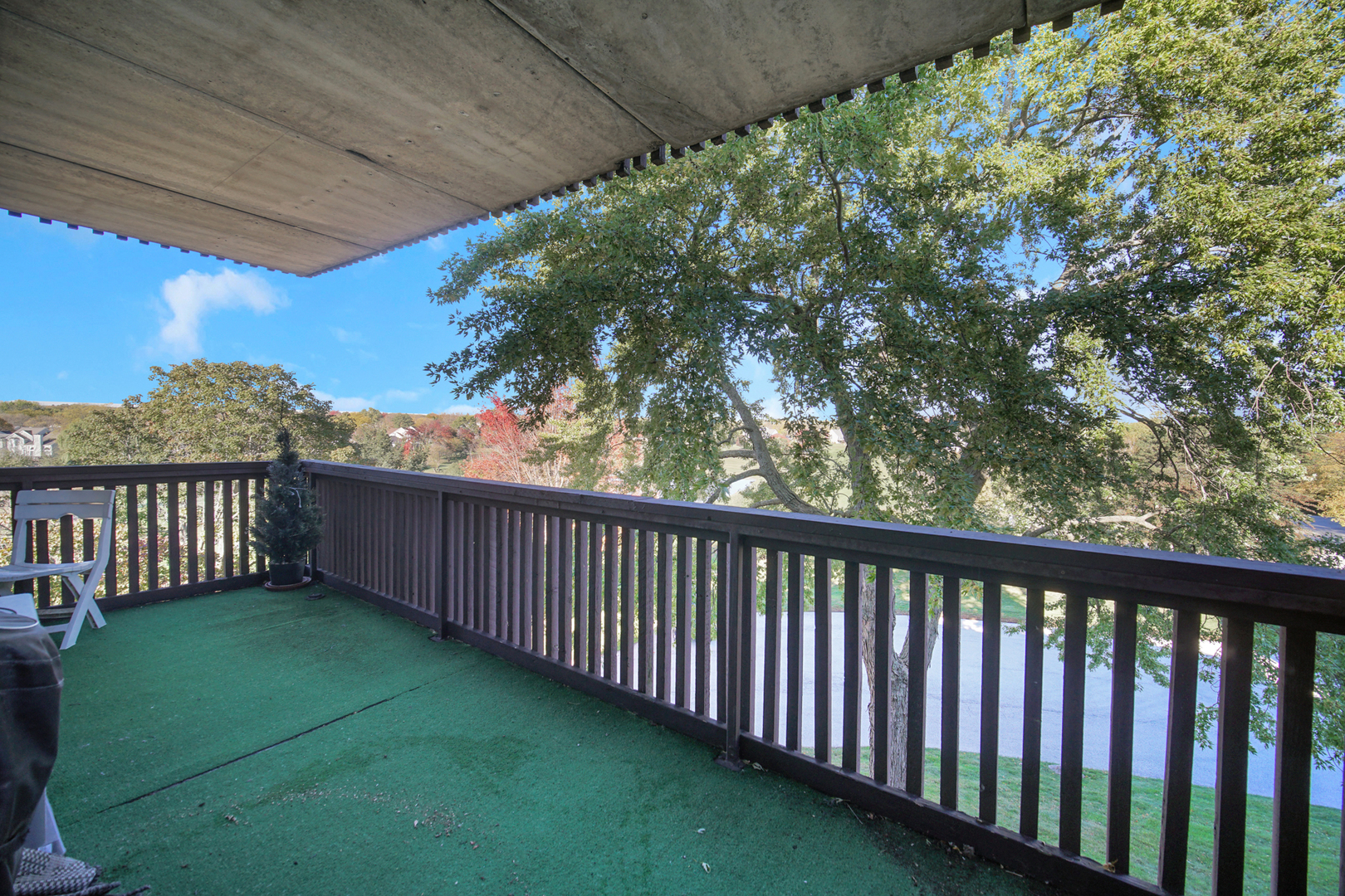 690 Chandler Road, Unit 302 Gurnee, IL 60031 - Photo 29 of 51 a balcony with outdoor space