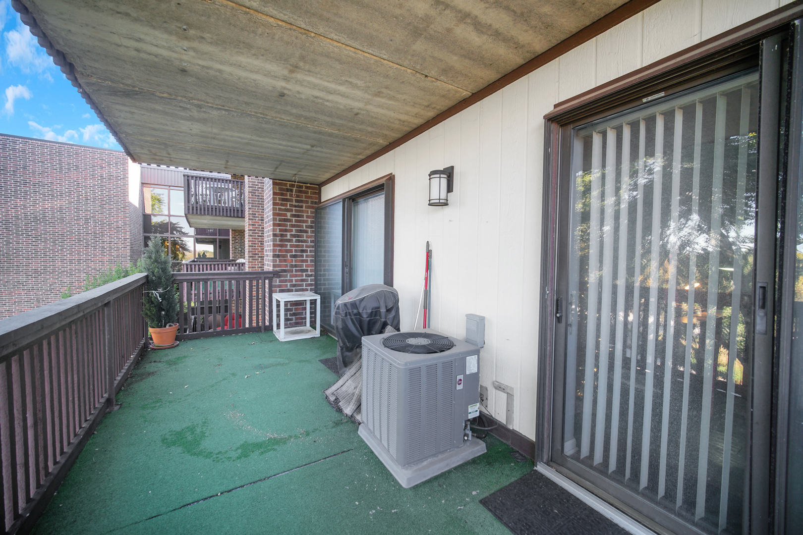 690 Chandler Road, Unit 302 Gurnee, IL 60031 - Photo 31 of 51 a view of a porch with furniture