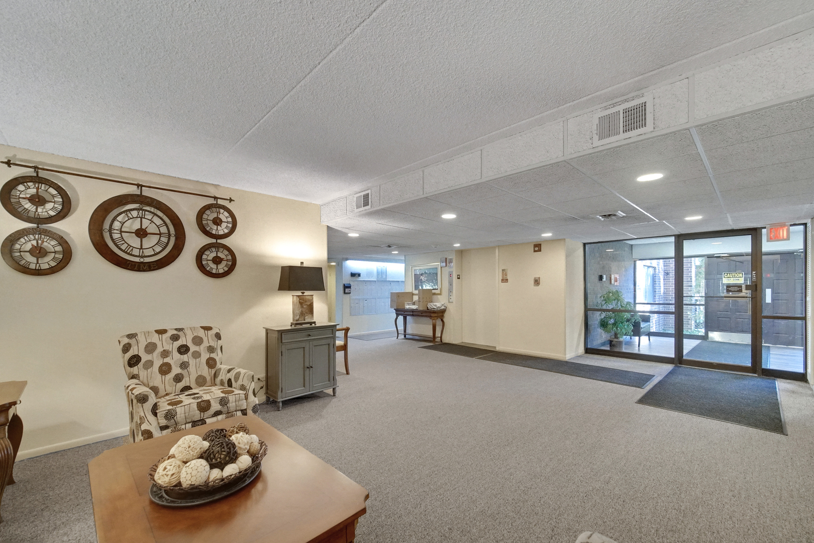 690 Chandler Road, Unit 302 Gurnee, IL 60031 - Photo 7 of 51 a living room with furniture and a large window