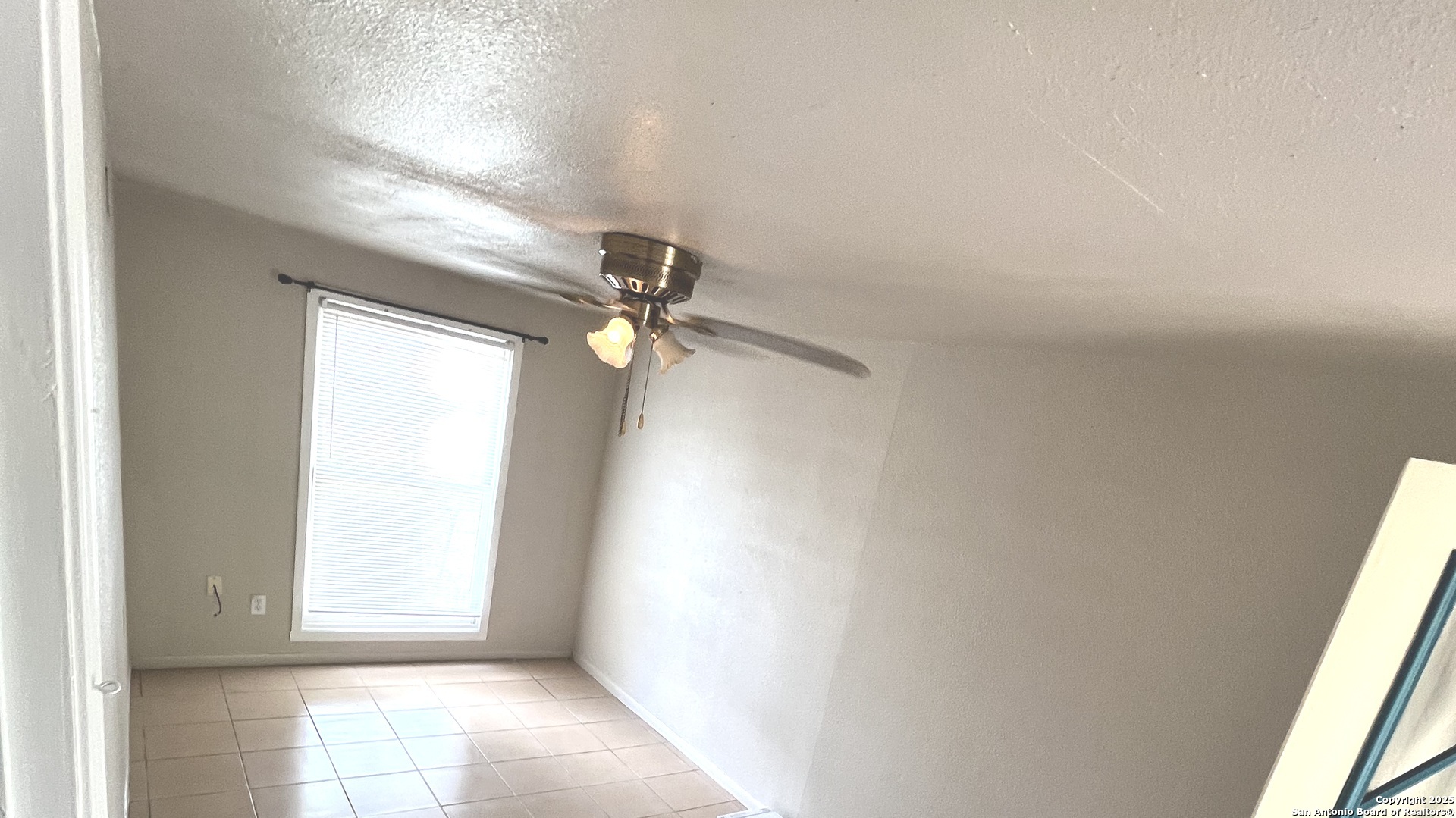 222 Audrey Alene Drive, Unit 2 San Antonio, TX 78216 - Photo 1 of 11 a view of empty room with windows