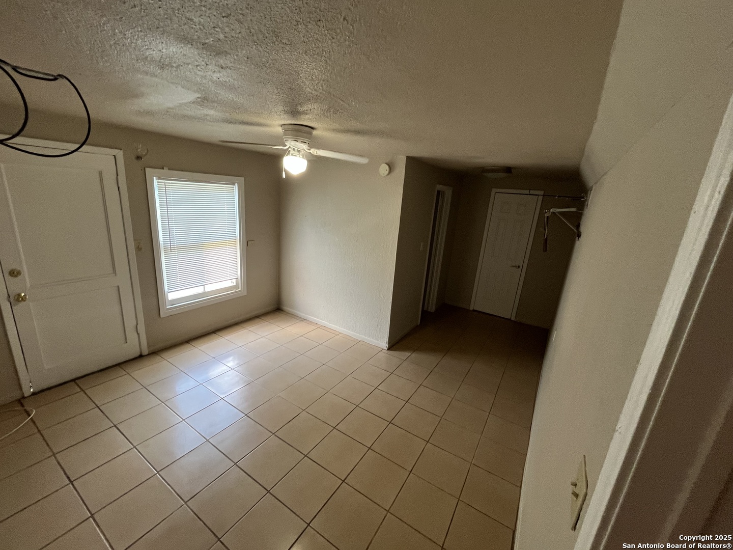 222 Audrey Alene Drive, Unit 2 San Antonio, TX 78216 - Photo 5 of 11 wooden floor in an empty room