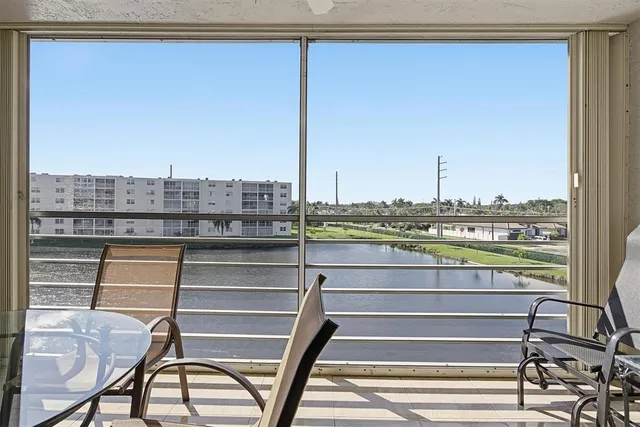a view of a lake from a balcony