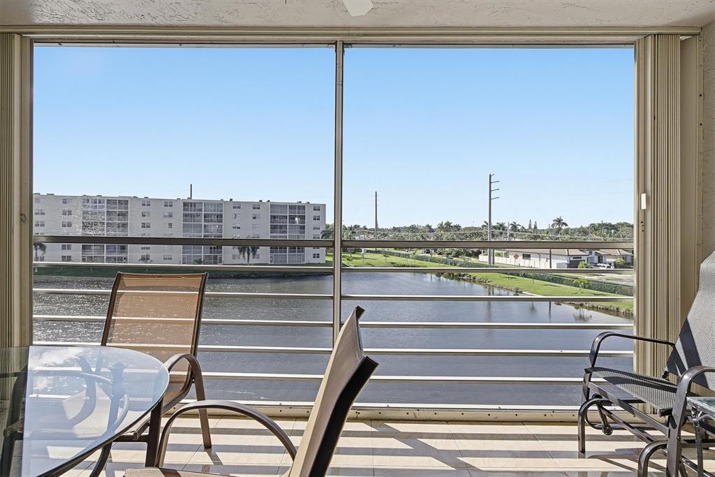311 Southeast 3rd Street, Unit 410 Dania Beach, FL 33004 - Photo 14 of 51 a view of a lake from a balcony