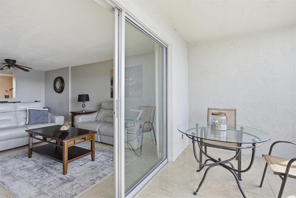 311 Southeast 3rd Street, Unit 410 Dania Beach, FL 33004 - Photo 17 of 51 a living room with furniture and a window
