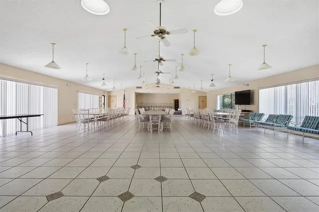 a view of a living room and kitchen view
