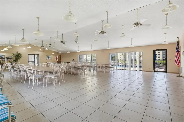 a view of a lobby with black carpet