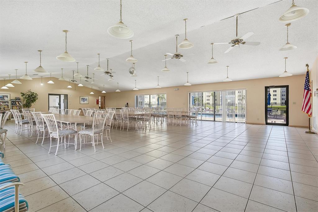311 Southeast 3rd Street, Unit 410 Dania Beach, FL 33004 - Photo 35 of 51 a view of a lobby with black carpet