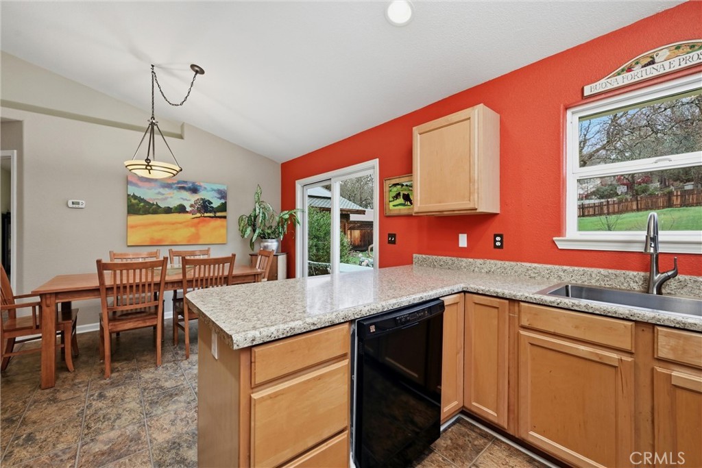 19072 Hidden Valley Road Hidden Valley Lake, CA 95467 - Photo 10 of 27 a kitchen with stainless steel appliances granite countertop sink stove and cabinets