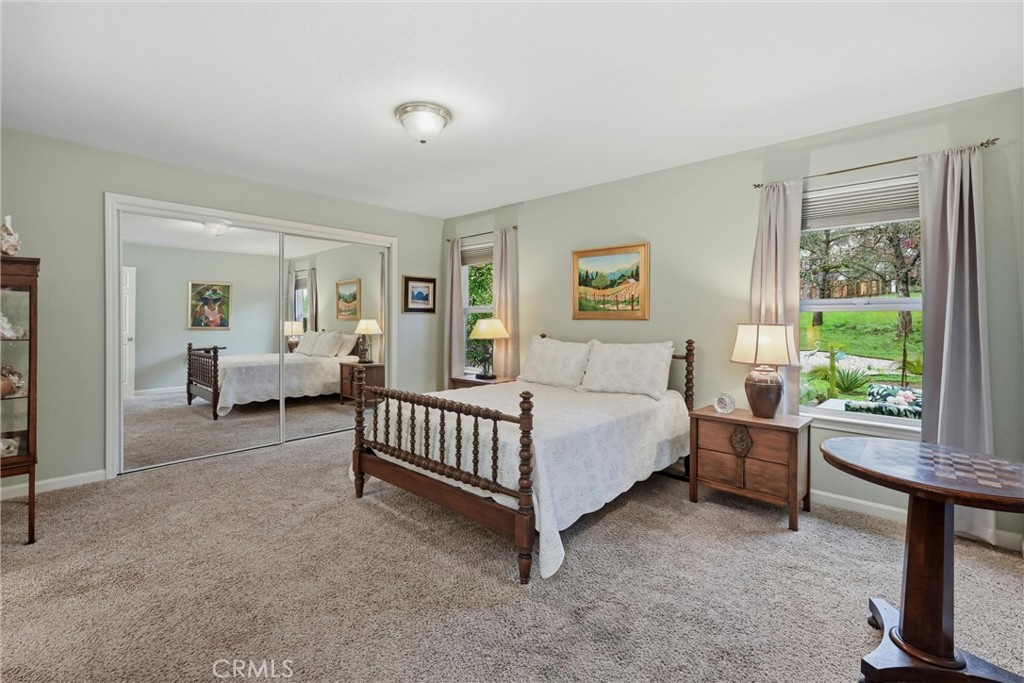 19072 Hidden Valley Road Hidden Valley Lake, CA 95467 - Photo 11 of 27 a bedroom with a bed and a view of bedroom