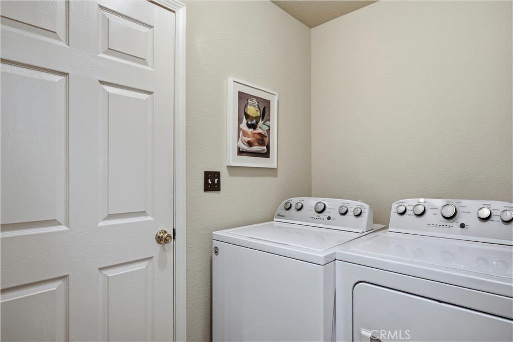 19072 Hidden Valley Road Hidden Valley Lake, CA 95467 - Photo 17 of 27 a utility room with dryer and washer