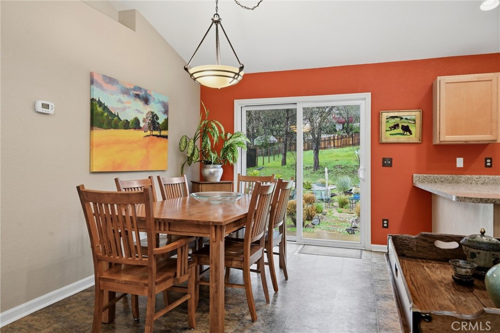 19072 Hidden Valley Road Hidden Valley Lake, CA 95467 - Photo 6 of 27 a view of a dining room with furniture window and outside view