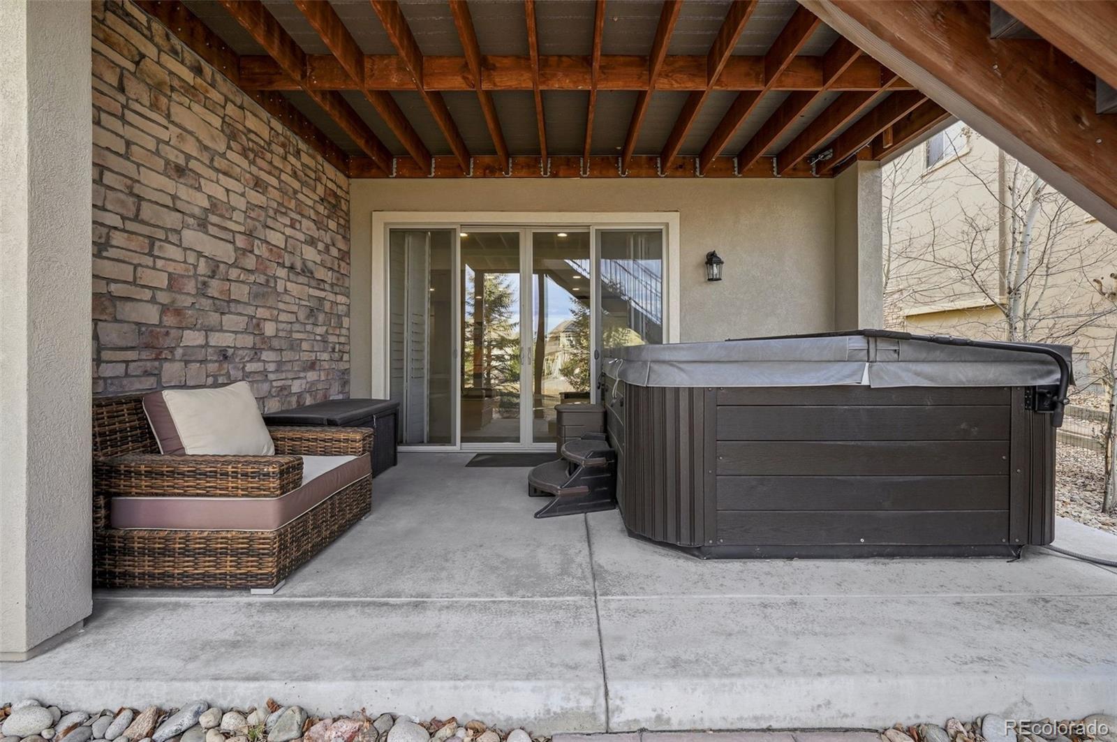 769 Winding Pine Lane Highlands Ranch, CO 80126 - Photo 47 of 50 a building outdoor space with patio furniture