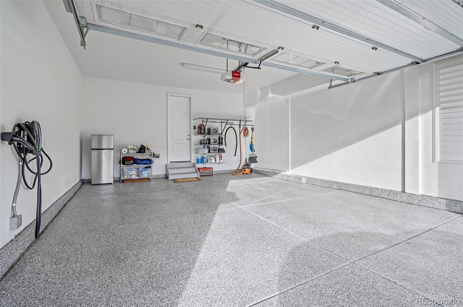 769 Winding Pine Lane Highlands Ranch, CO 80126 - Photo 48 of 50 a view of a garage with furniture