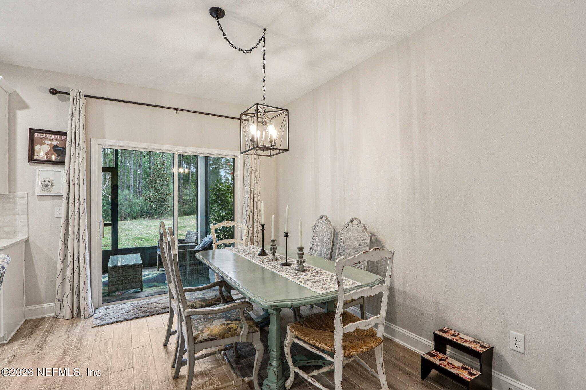 12068 Calvesta Street Jacksonville, FL 32256 - Photo 11 of 100 a view of a dining room with furniture window and outside view