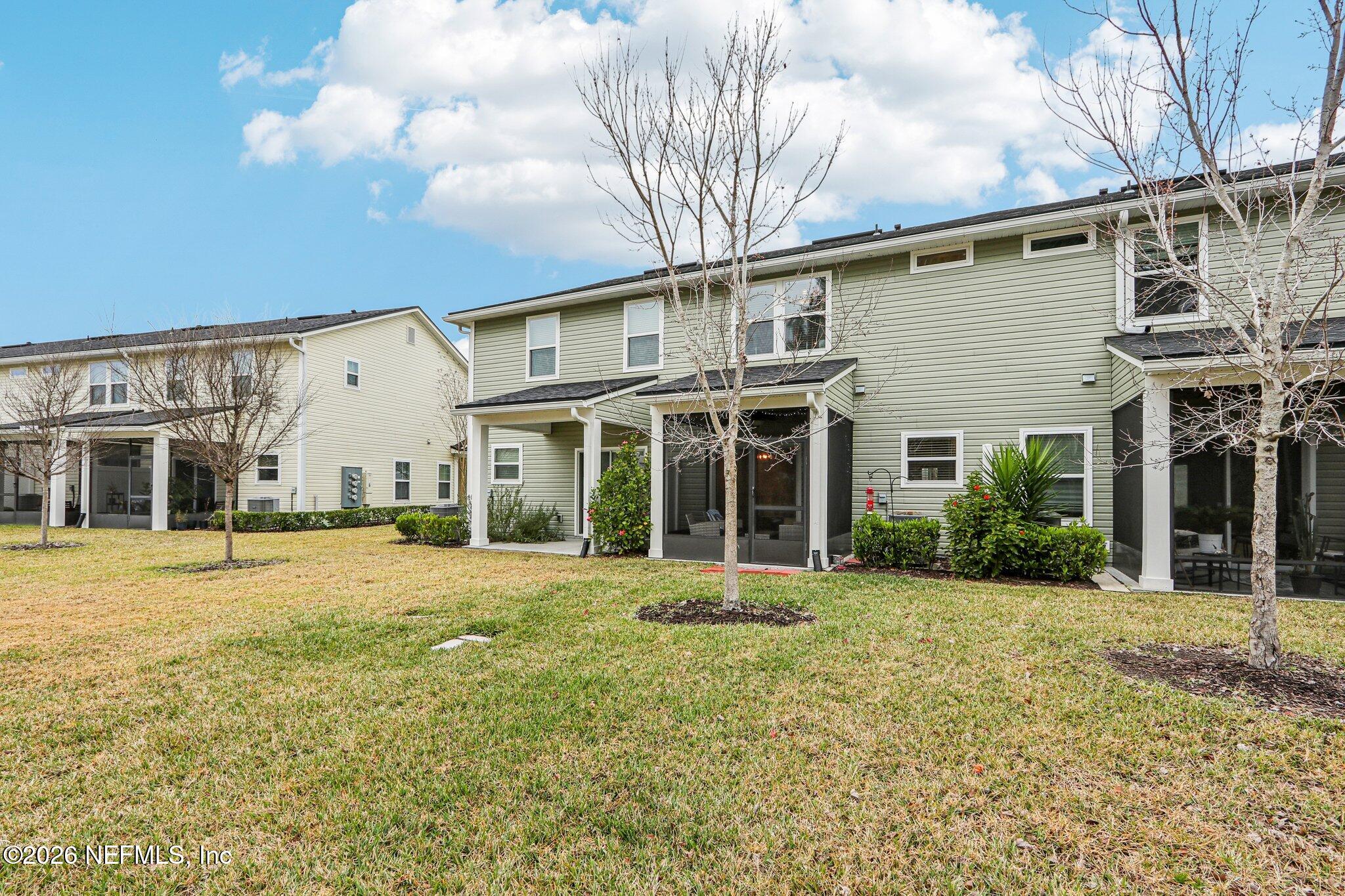 12068 Calvesta Street Jacksonville, FL 32256 - Photo 52 of 100 Rear Townhome View 2