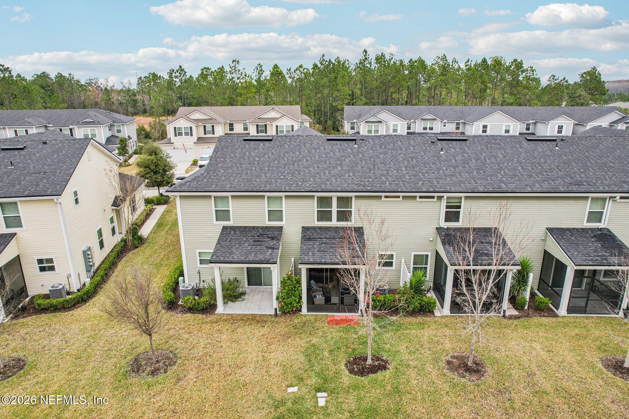 12068 Calvesta Street Jacksonville, FL 32256 - Photo 6 of 100 Rear of Townhome - Aerial View 1