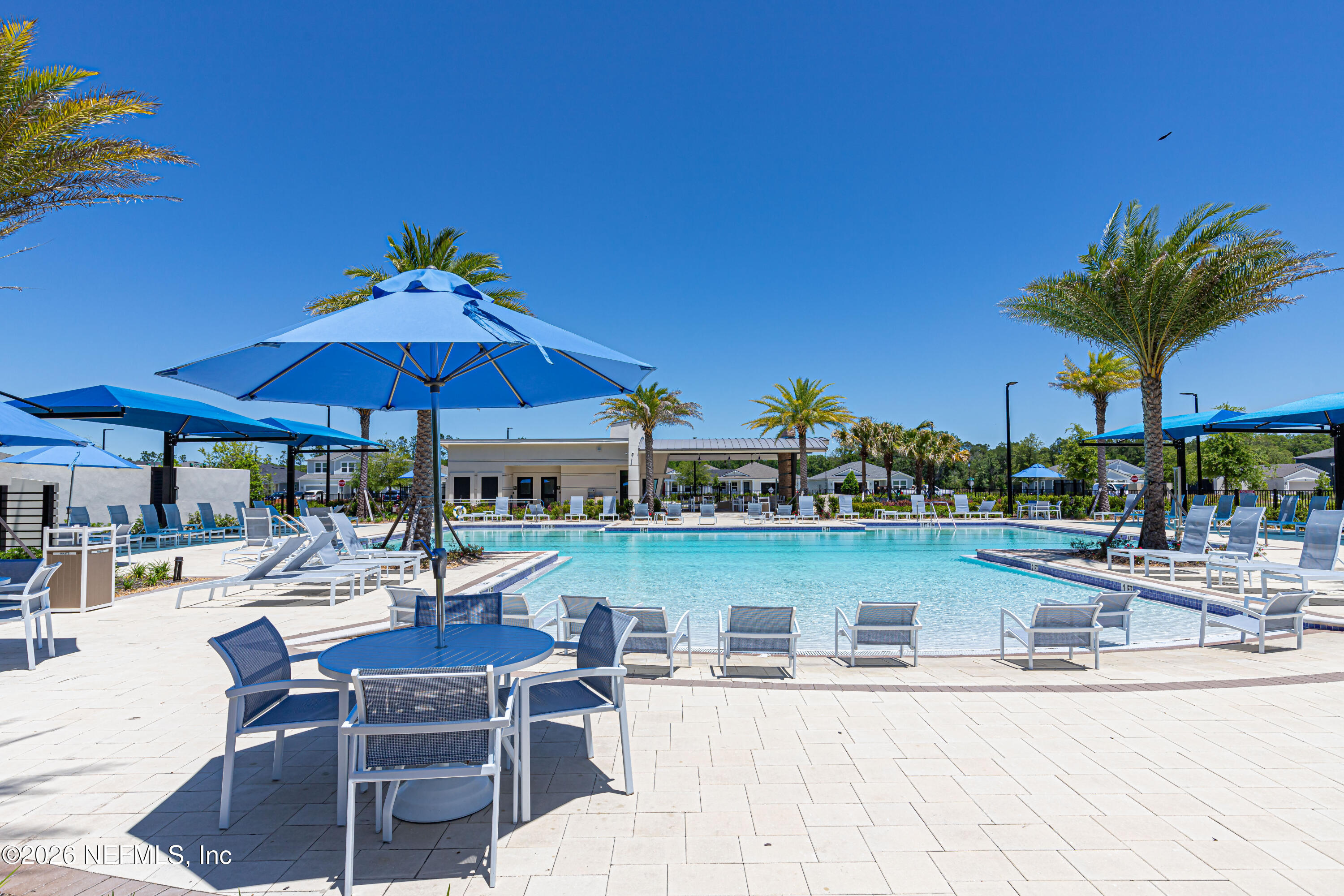 12068 Calvesta Street Jacksonville, FL 32256 - Photo 88 of 100 a view of a swimming pool with outdoor seating space
