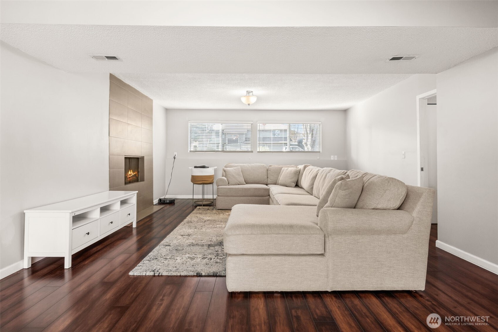 19234 121st Place Southeast Kent, WA 98031 - Photo 19 of 37 a living room with furniture and wooden floor