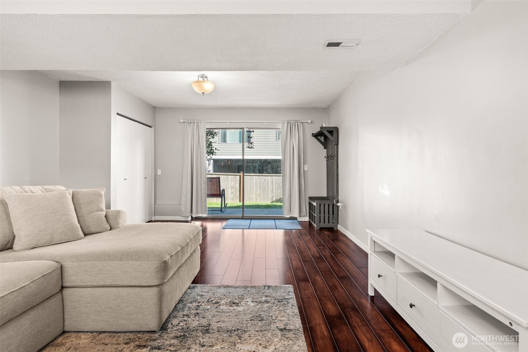 19234 121st Place Southeast Kent, WA 98031 - Photo 21 of 37 a living room with furniture and a window