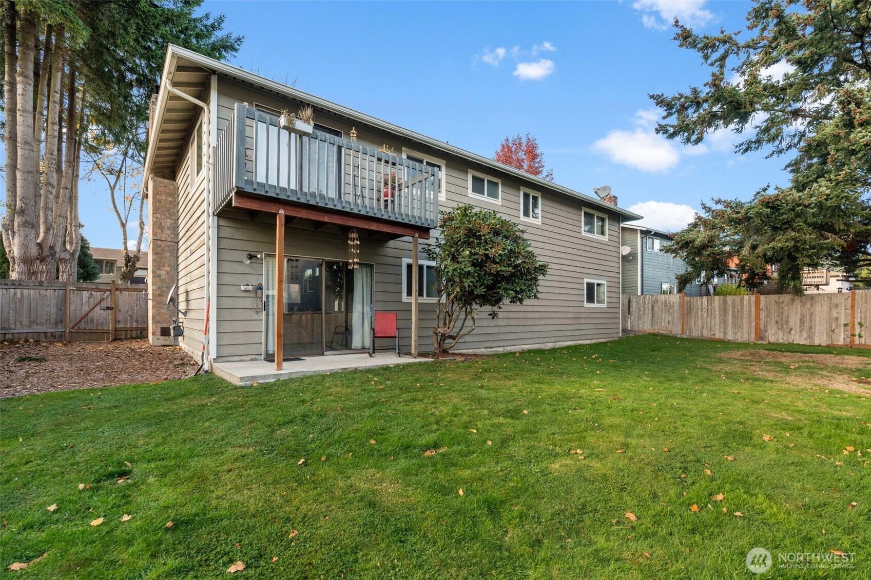 19234 121st Place Southeast Kent, WA 98031 - Photo 31 of 37 a view of a house with a yard and tree s
