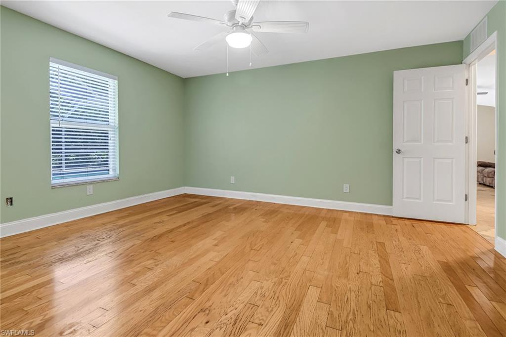 8116 Sandpiper Road Fort Myers, FL 33967 - Photo 14 of 29 Spare room with light hardwood / wood-style floors and ceiling fan