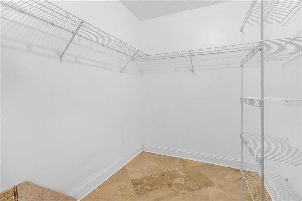 8116 Sandpiper Road Fort Myers, FL 33967 - Photo 19 of 29 Spacious closet featuring light tile flooring