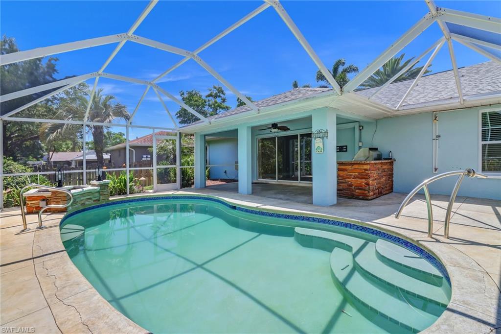 8116 Sandpiper Road Fort Myers, FL 33967 - Photo 24 of 29 View of pool with a patio, and ceiling fan, and built in kitchen