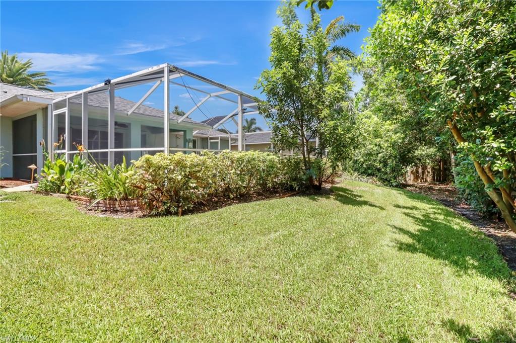 8116 Sandpiper Road Fort Myers, FL 33967 - Photo 28 of 29 View of yard featuring a lanai