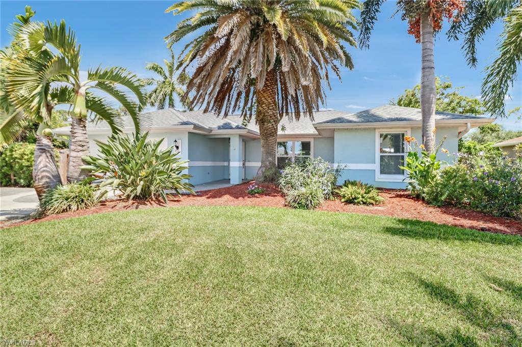 8116 Sandpiper Road Fort Myers, FL 33967 - Photo 3 of 29 View of front of home featuring a front yard