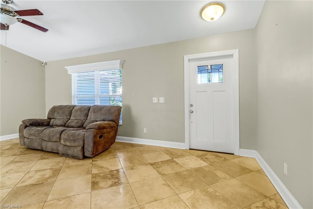 8116 Sandpiper Road Fort Myers, FL 33967 - Photo 4 of 29 Tiled entrance foyer featuring ceiling fan